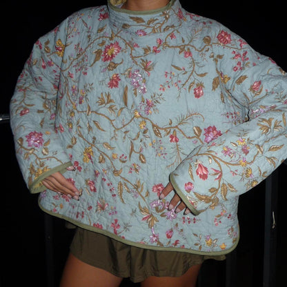 Light blue floral quilted mockneck
